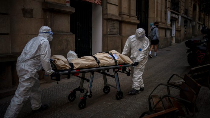 Virus Outbreak Spain's Body Collectors