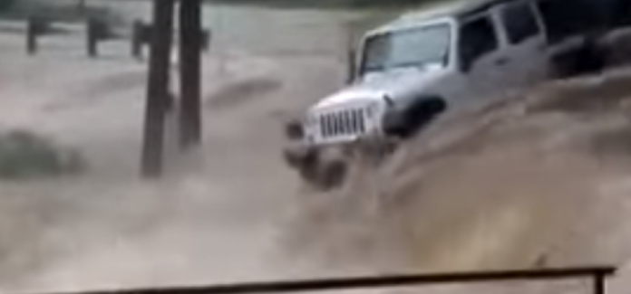 Minister Shashendra Rajapaksha's Jeep on flood